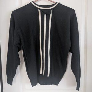 Soft black and white knit sweater with bow